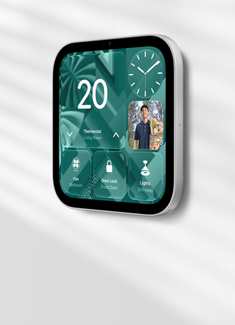Apple HomeView wall-mounted model on a wall, silver color, displaying time, temperature, and controls for thermostat, bedroom fan, door lock, and lights